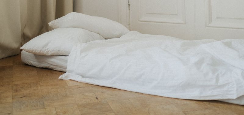 futon mattress on a floor